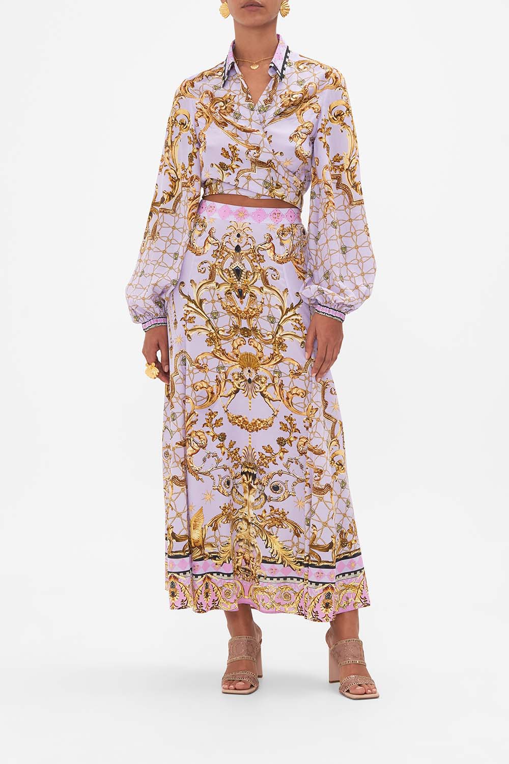 Front view of model wearing CAMILLA flowy silk maxi skirt in Lavender Ever After print