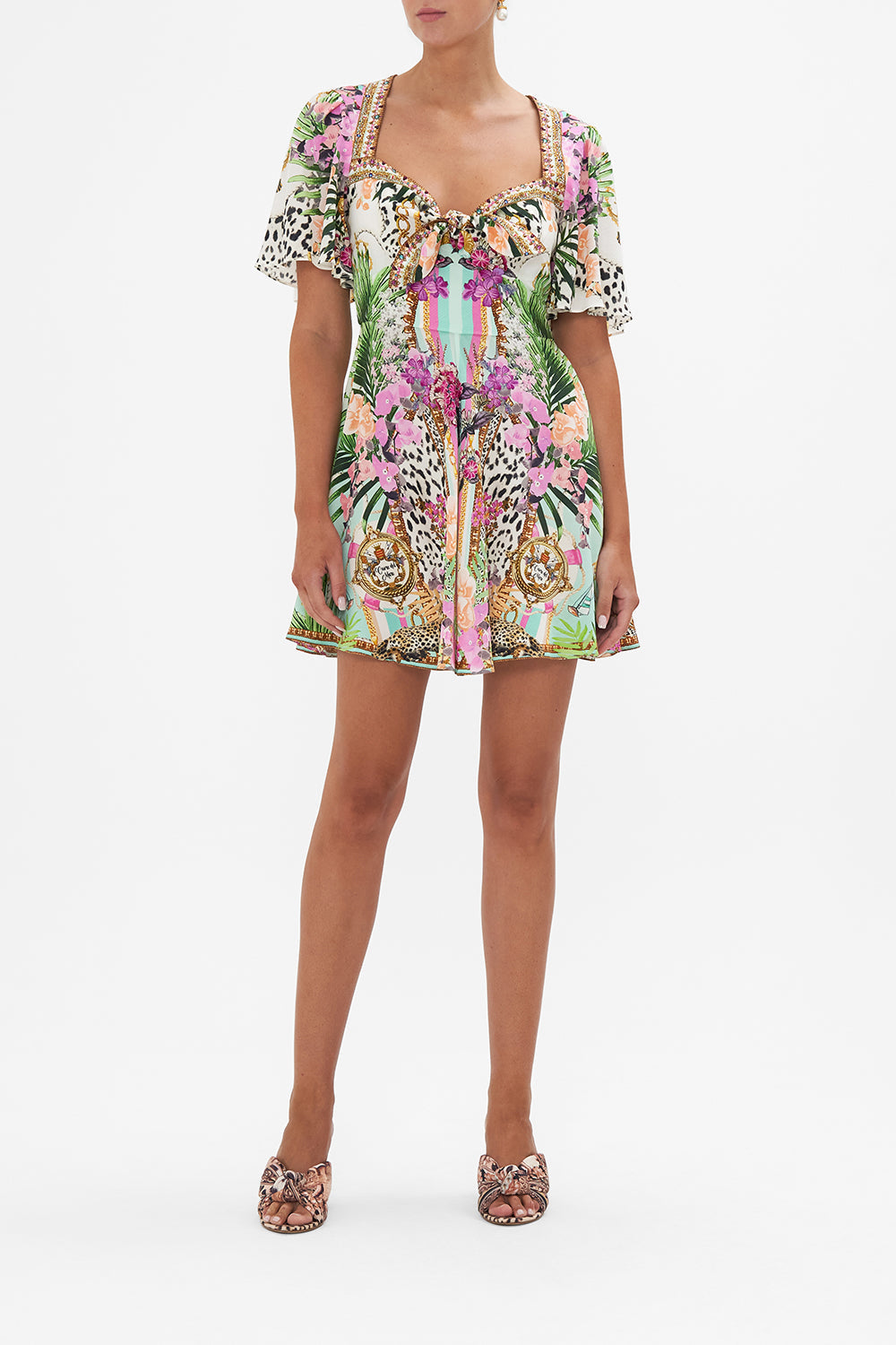 Front view of model wearing CAMILLA silk tie front mini dress in Dear Amore Mio print