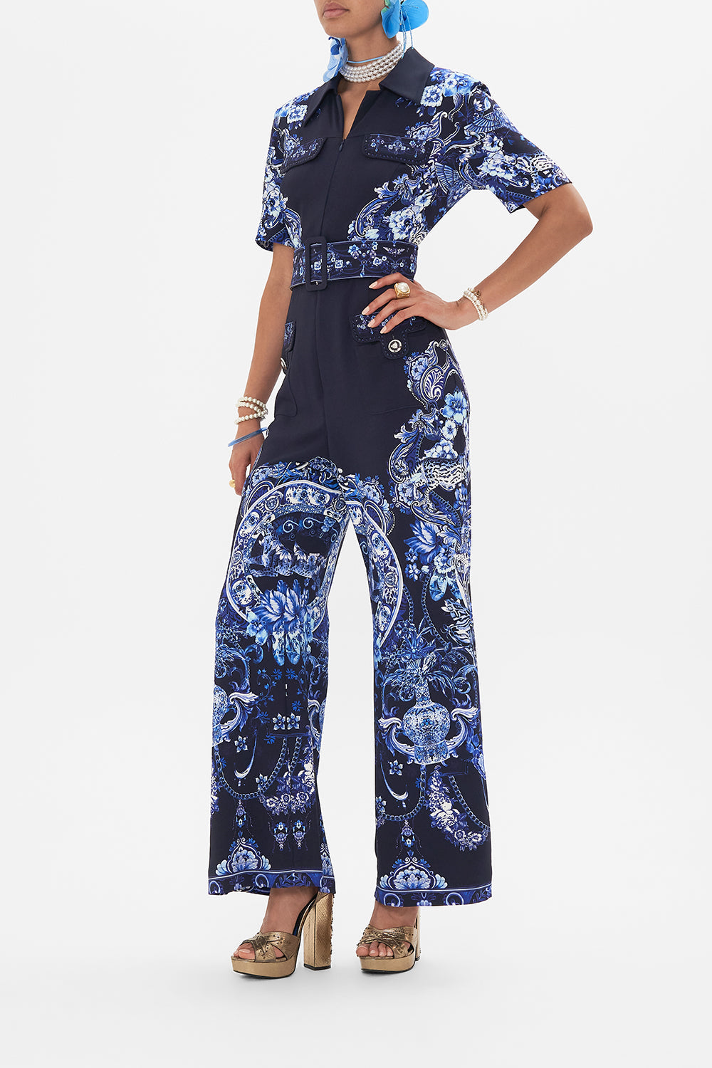 Side view of model wearing CAMILLA jumpsuit in Delft Dynasty print