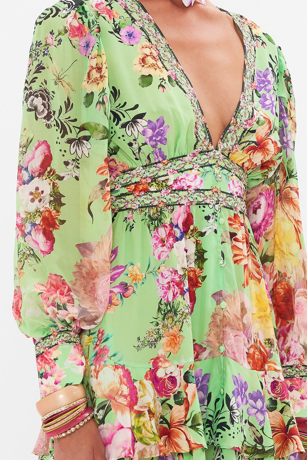 Detail view of model wearing CAMILLA silk dress in Porcelain Dream print