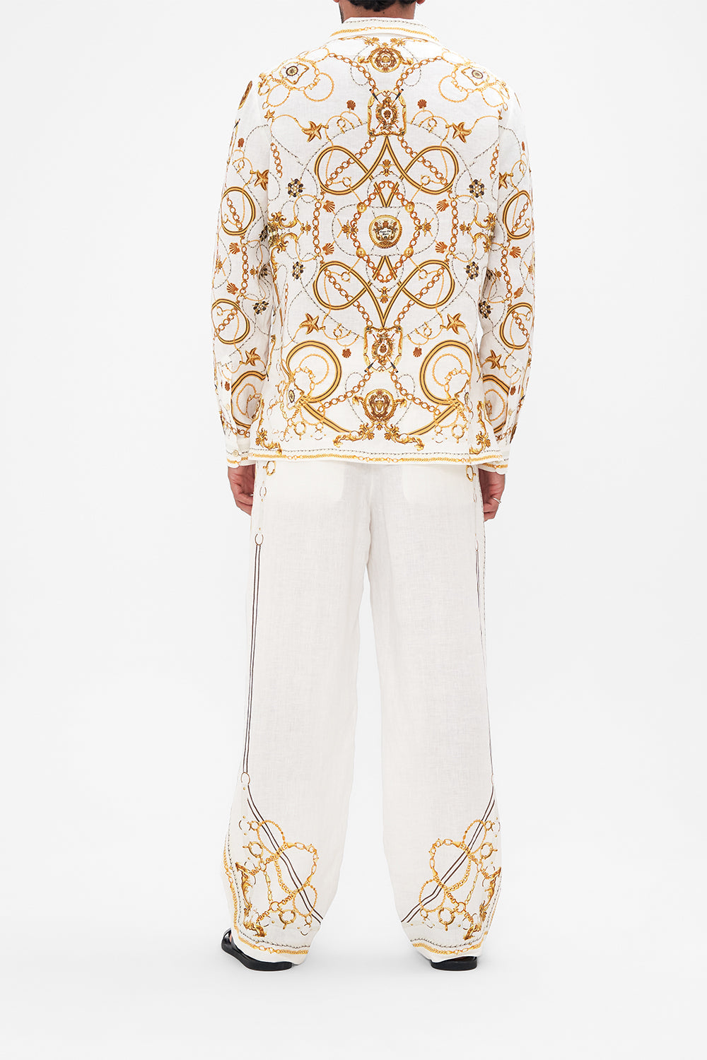 Back view of model wearing Hotel Franks By CAMILLA mens long sleeve camp collared shirt in Coast To Coast print