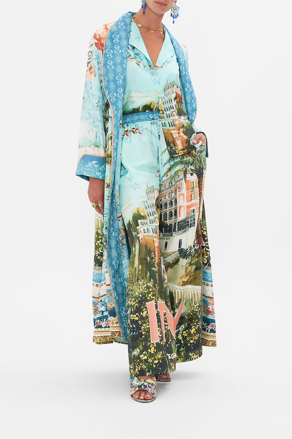 Detail view of model wearing CAMILLA long silk robe in From Sorrento With Love print