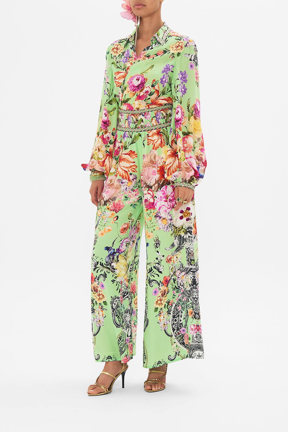 Side view of model wearing CAMILLA silk shirt dress in Delft Dynasty print