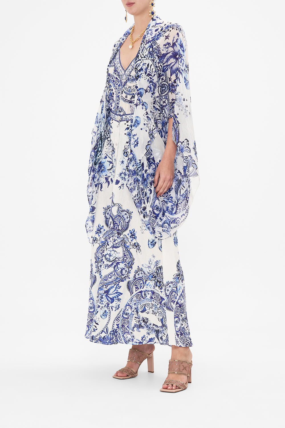 Side view of model wearing CAMILLA silk shrug in Glaze And Graze print