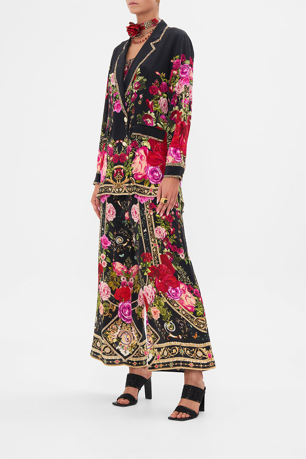 Side view of model wearing CAMILLA silk jacket in Reservation For Love print