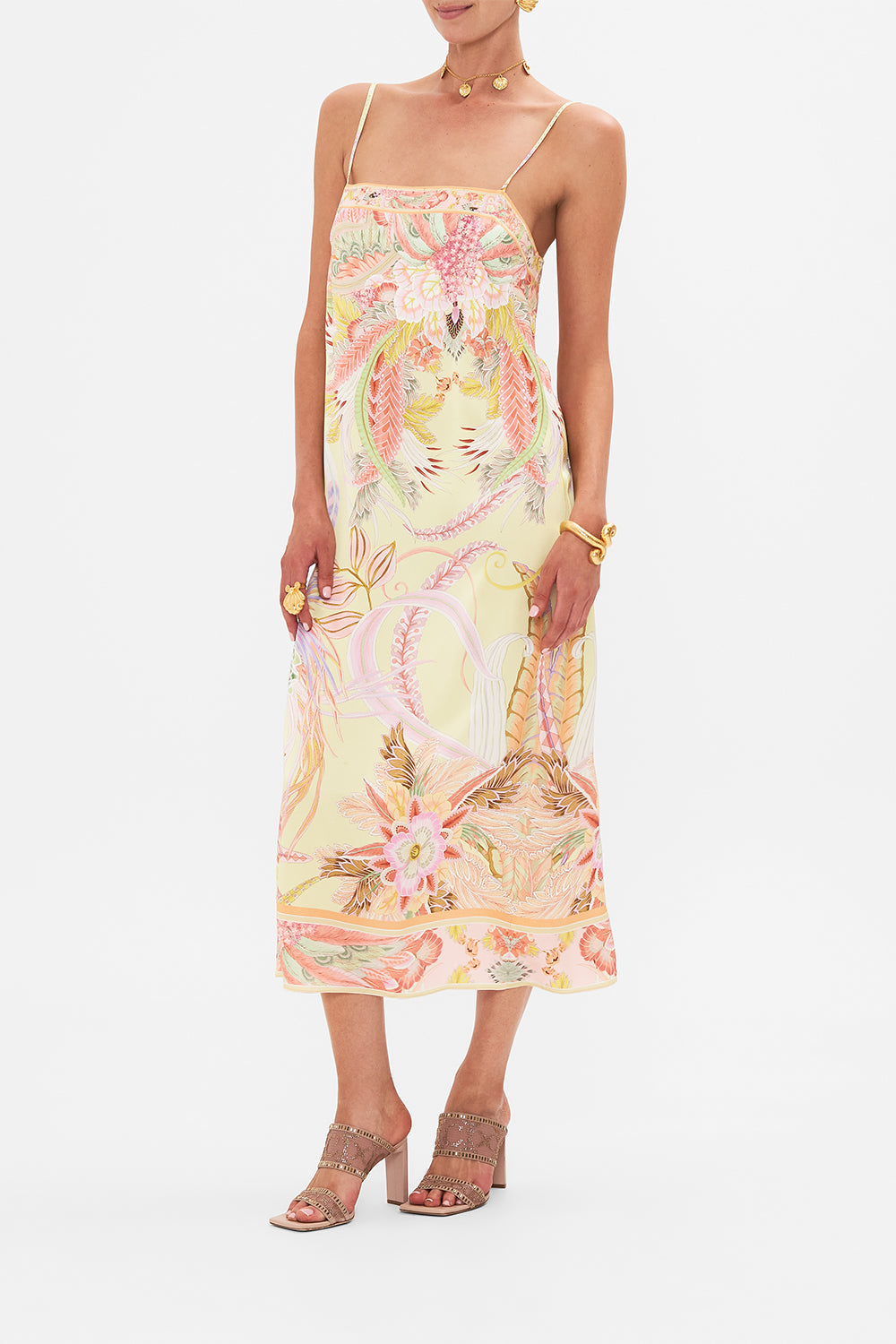 Side view of model wearing CAMILLA luxury silk dress in Cosmic Tuscan print