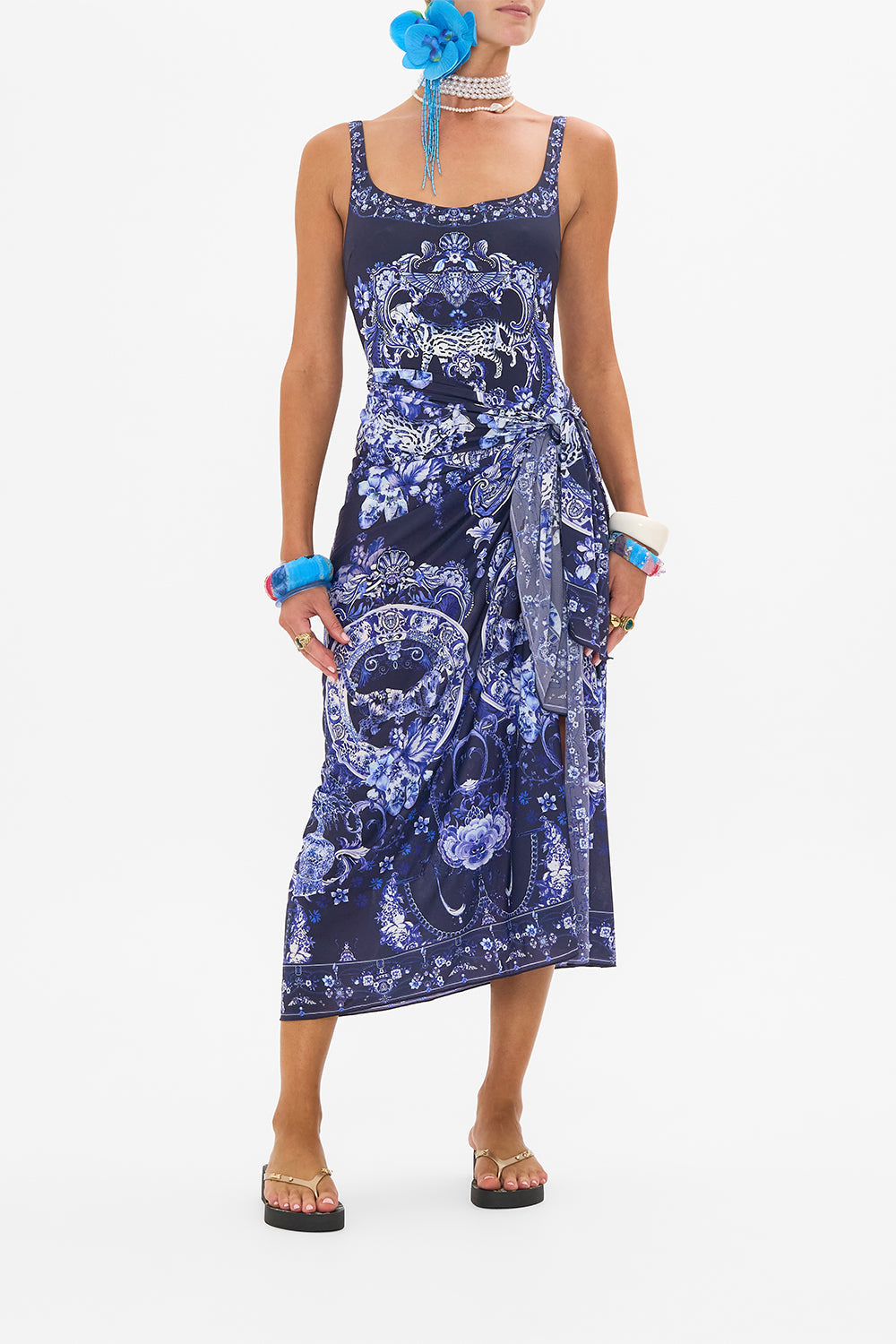 Front view of model wearing CAMILLA resort wear saarong in Porcelain Dream print