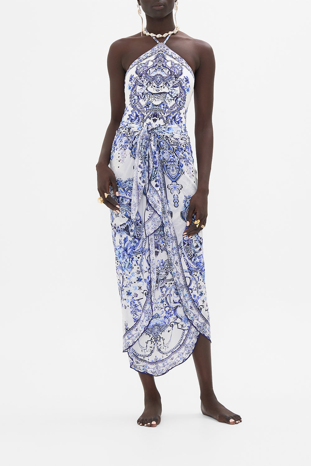 Front view of model wearing CAMILLA resort wear sarong in Glaze and Graze print