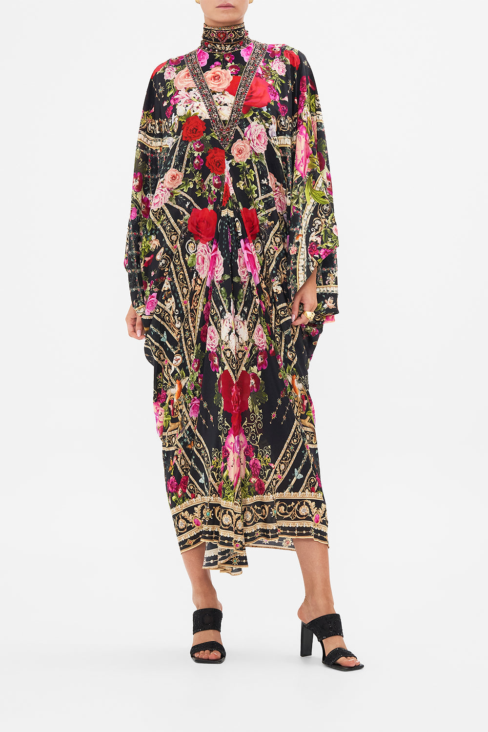 Crop view of model wearing CAMILLA designer resort wear silk kaftan print in Reservation For Love print