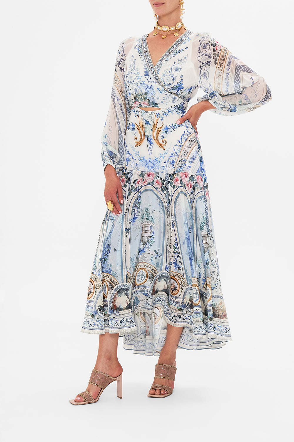 Crop view of model wearing CAMILLA wrap dress in Seasson Of The Siren print