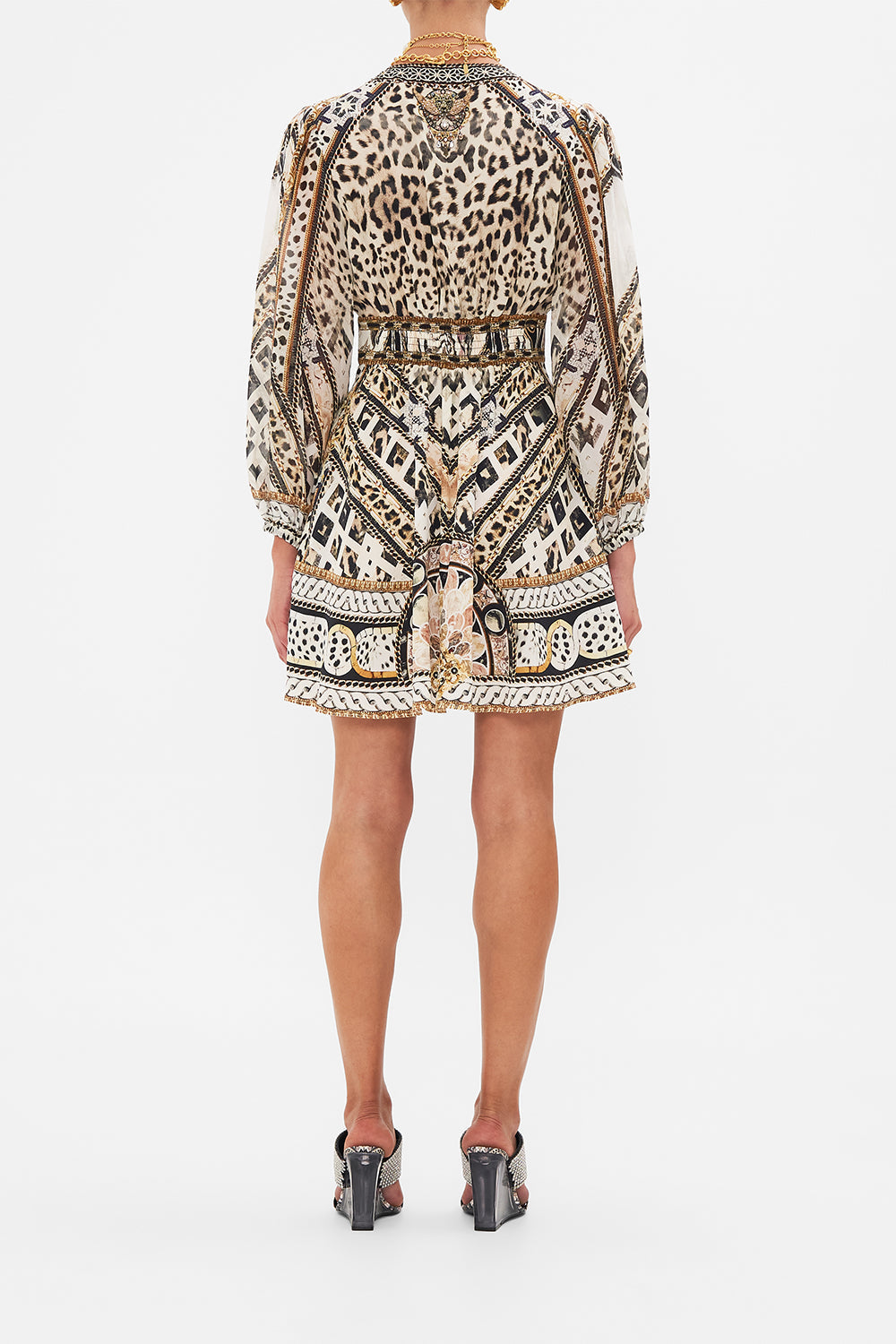 Back view of model wearing CAMILLA silk mini dress in Mosaic Muse animal print