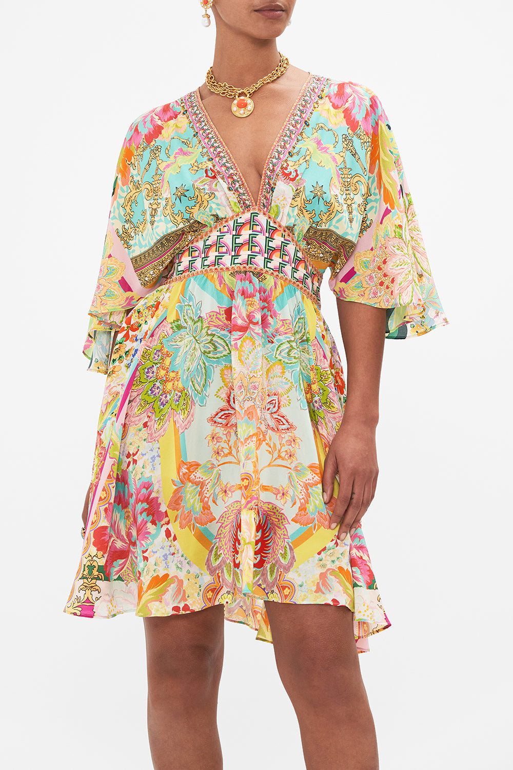 Crop view of model wearing CAMILLA silk mini dress in An Italian Welcome print