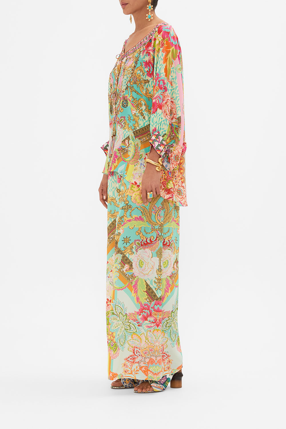 Side view of model wearing CAMILLA printed silk blouse in An Italian Welcome print