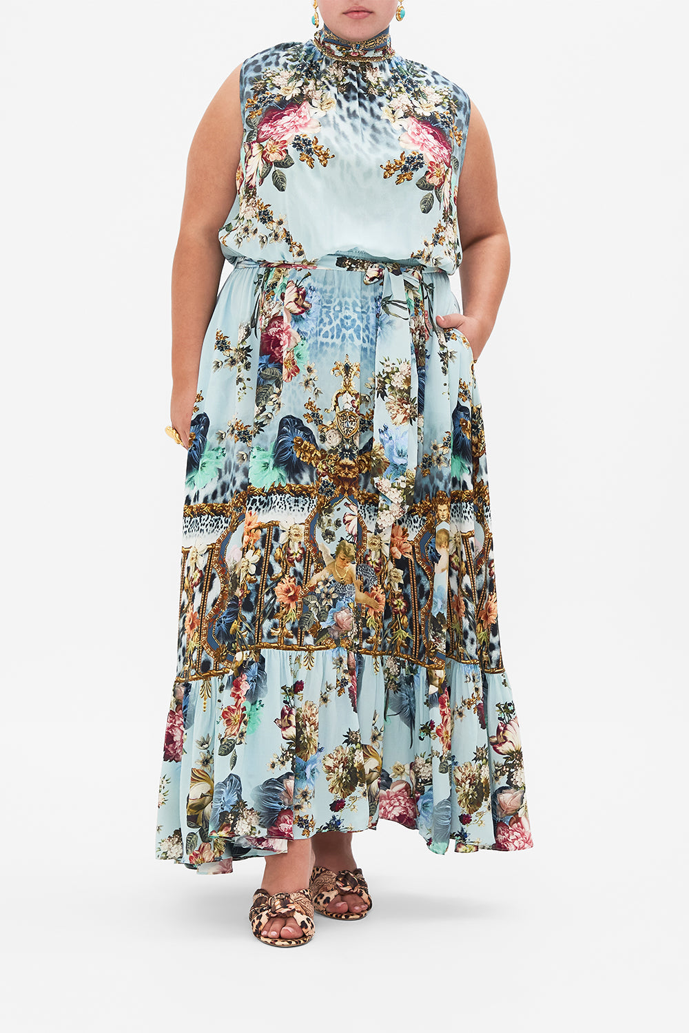 Front view of curvy model wearing CAMILLA plus size blue silk maxi dress in Letters to Leo print