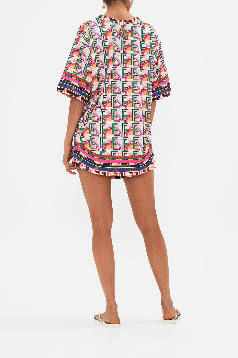 Back view of model wearing CAMILLA activewear tee in Ciao Bella print