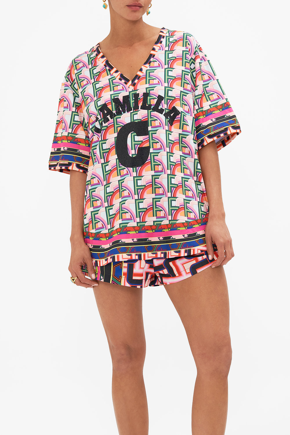 Crop view of model wearing CAMILLA activewear tee in Ciao Bella print