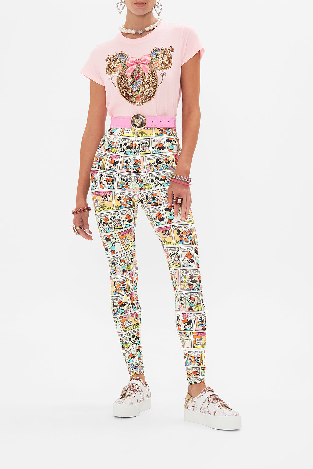 Front view of model wearing CAMILLA x Disney leggings in A Trip Down Comic Strip print