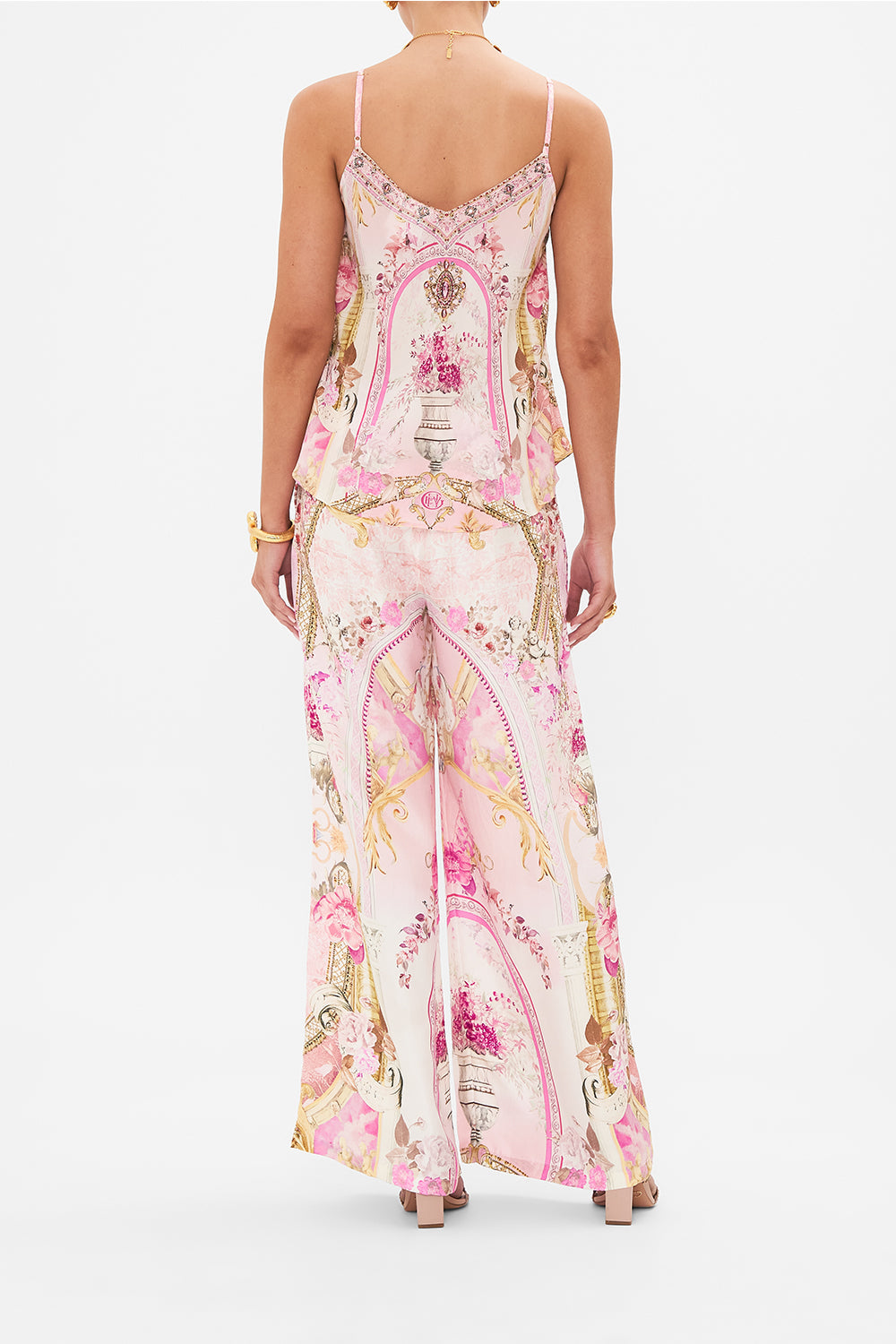 Back view of model wearing CAMILLA silk cami in Fresco Fairytale print