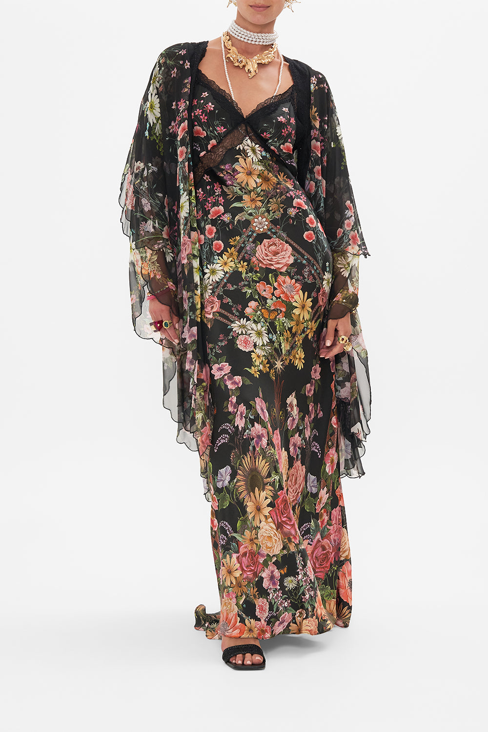 Detail view of model wearing CAMILLA silk layer in Letters From A Vineyard print