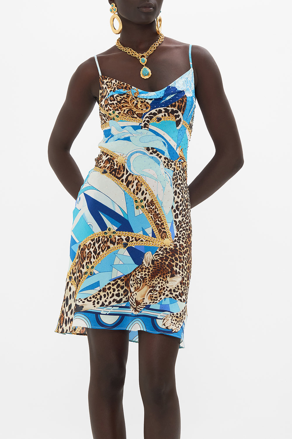 Crop view of model wearing CAMILLA silk slip dress in Sky Cheetah print