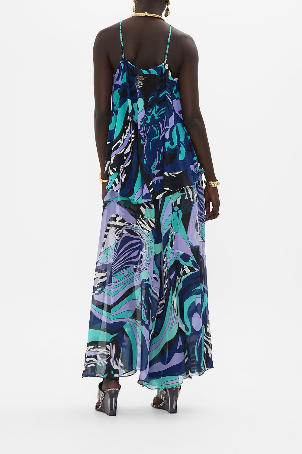 Back view of model wearing CAMILLA silk halter top in Vividly Venice print