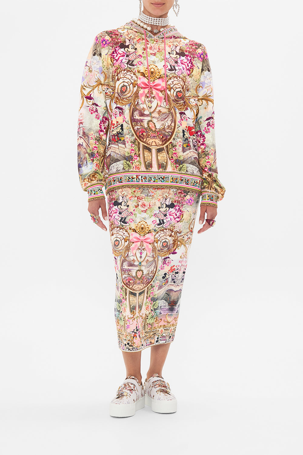 Front view of model wearing CAMILLA x Disney hoodie in Minnie Mouse Magic print