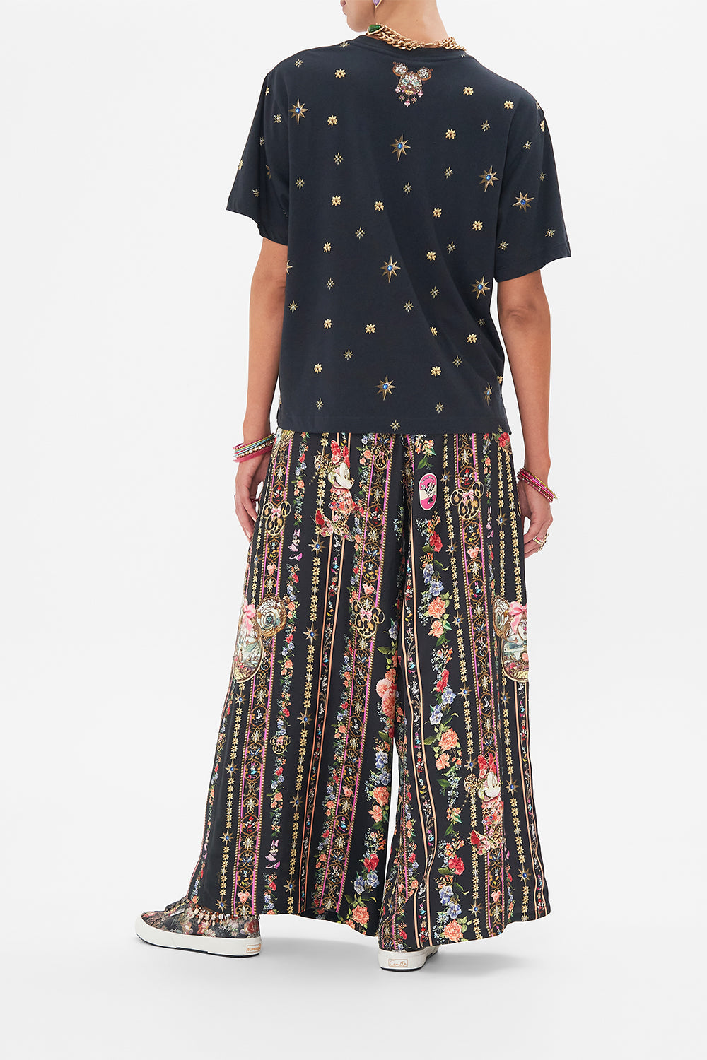 Back view of model wearing Disney x CAMILLA womens black t shirt in Midnight At Minnies