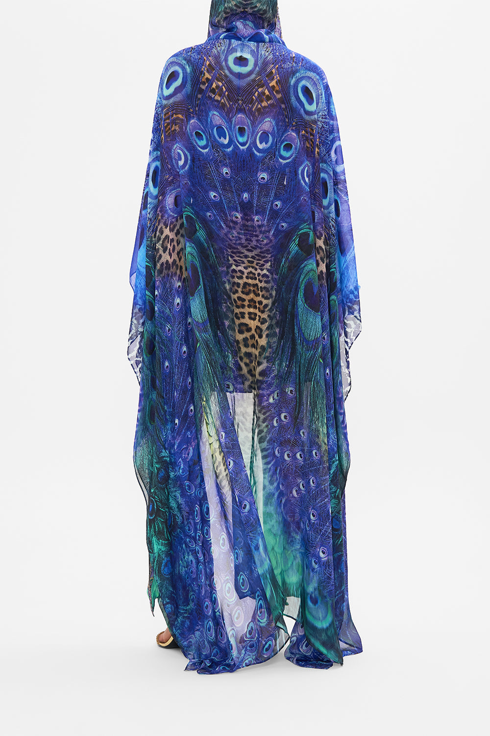 Back view of model wearing CAMILLA silk robe in Peacock Rock print
