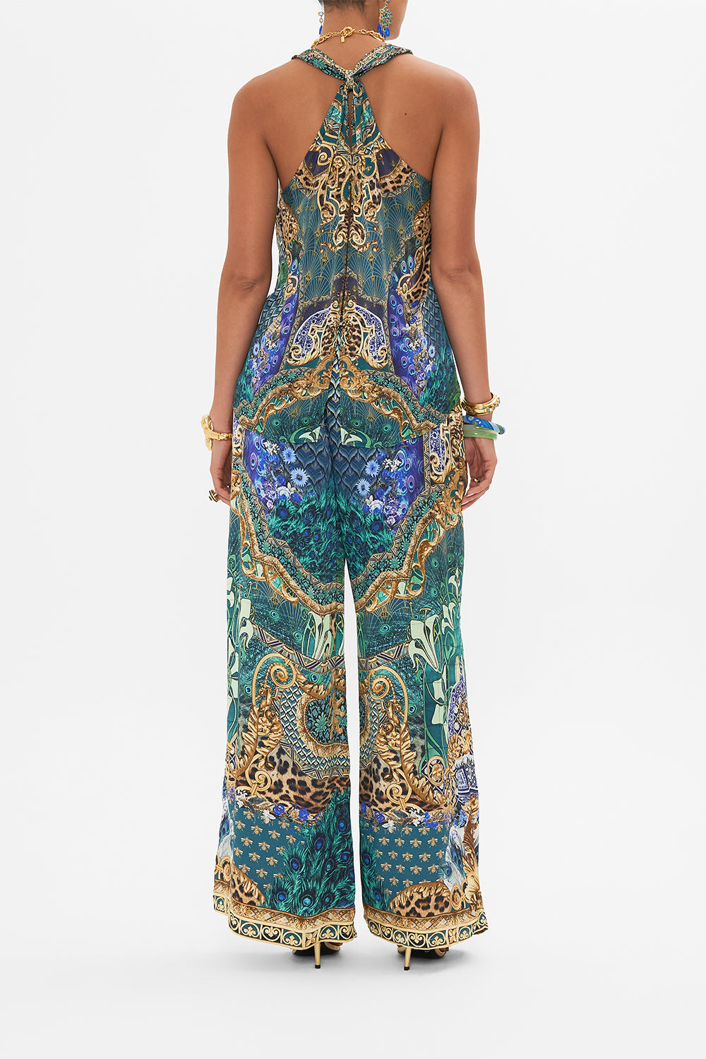 Back view of model wearing CAMILLA silk top in Fan Dance print