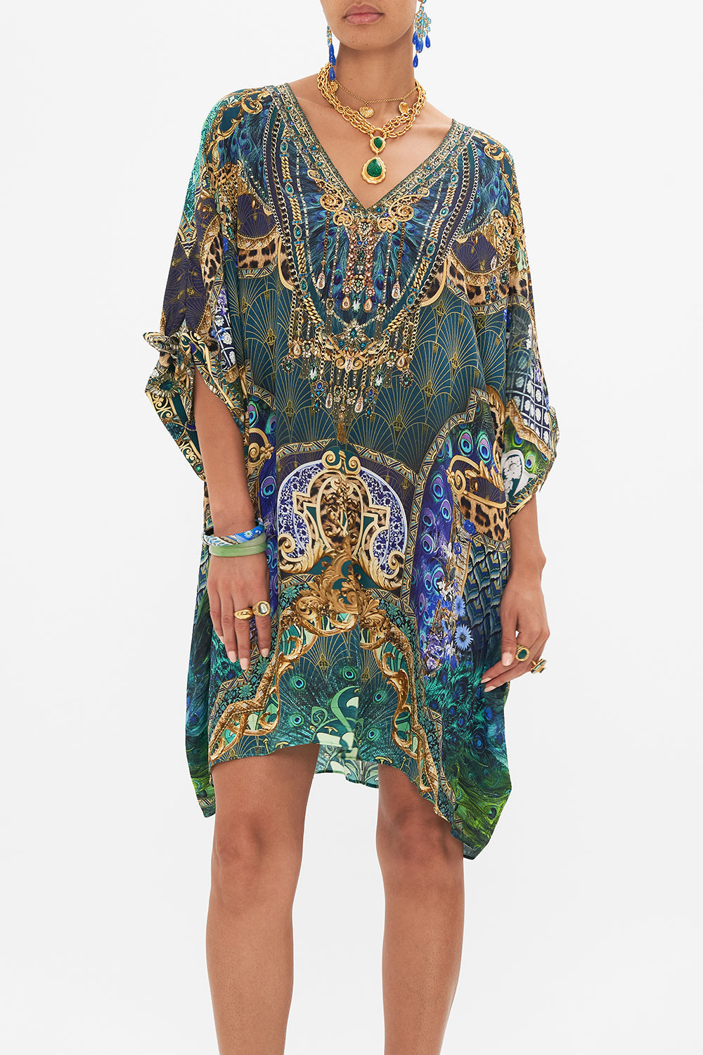 Detail view of model wearing CAMILLA short silk kaftan in Fan Dance print