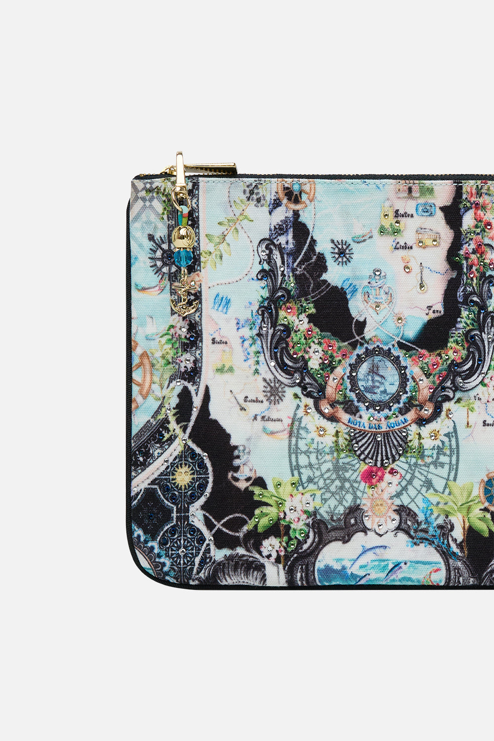 The CAMILLA Small Canvas Clutch in our Folk Afloat print.