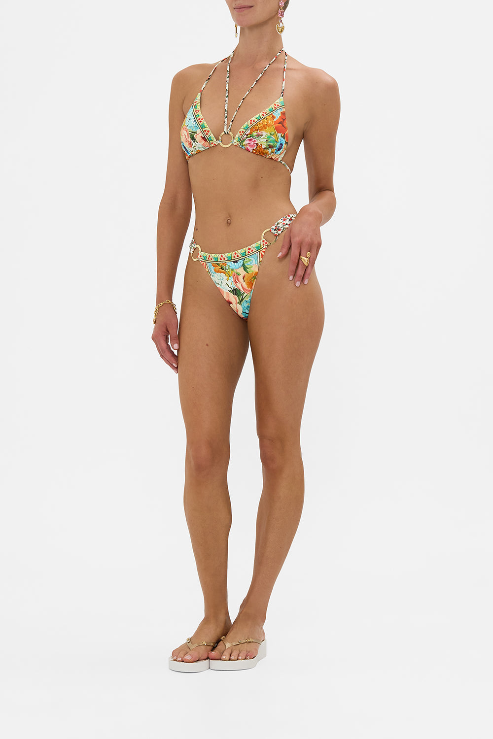 The CAMILLA Multi Strap Tri Bikini Set With Eyelet Trims in our Bathing Bombshell print.
