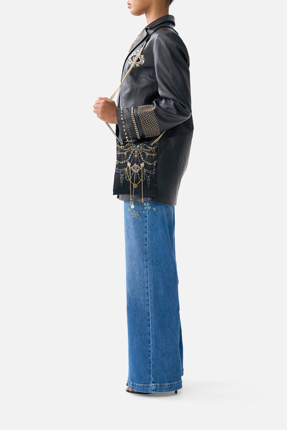 NORTH SOUTH DRAWSTRING BAG WITH CHAIN STRAP AMULETS AND ALCHEMY