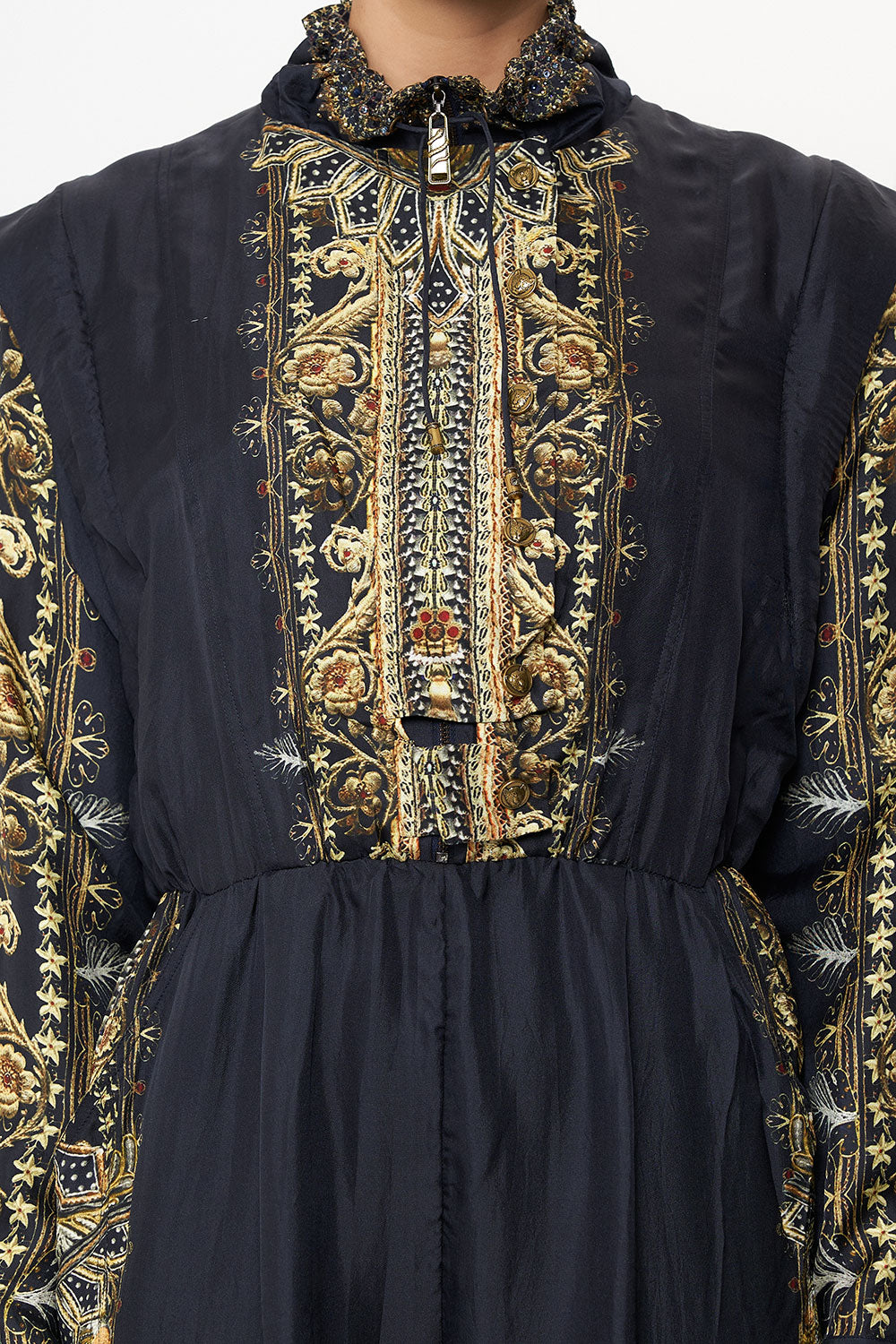 SHELL SUIT WITH REMOVABLE SLEEVE ITS ALL OVER TORERO