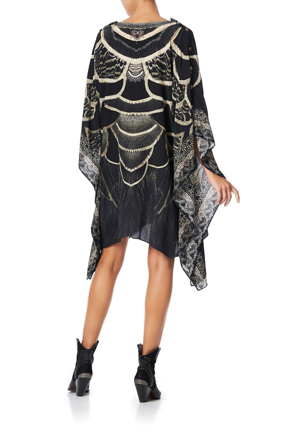 KAFTAN WITH BUTTON UP SLEEVES UNDER A FULL MOON