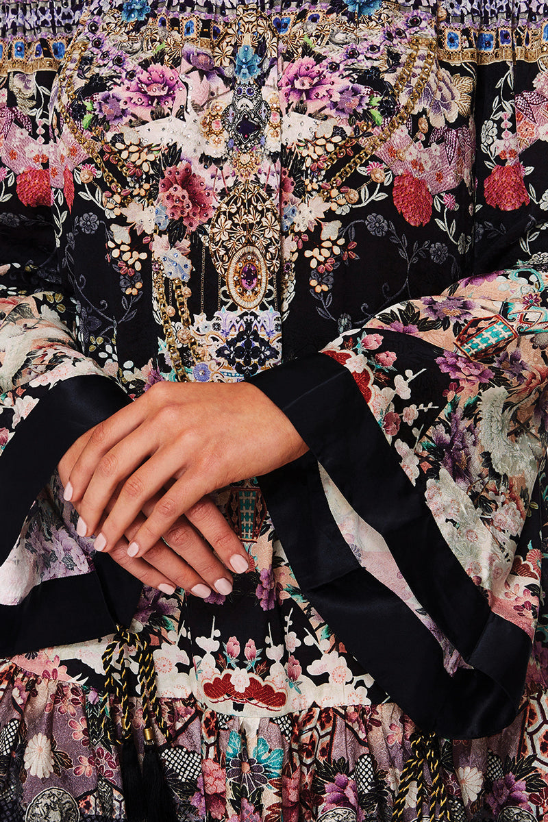 CAMILLA NIGHTS WITH HER OFF SHOULDER FRILL HEM DRESS