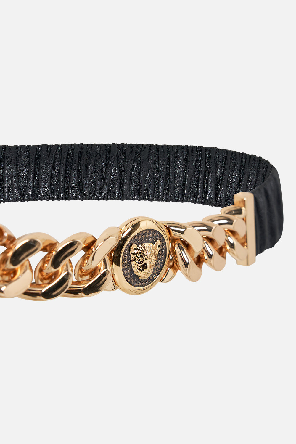 The CAMILLA LEOPARD BUTTON ELASTIC BELT SOLID BLACK in our  print.