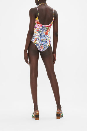 Back view of model wearing CAMILLA womens one piece swimsuit in Dutch Is Life print