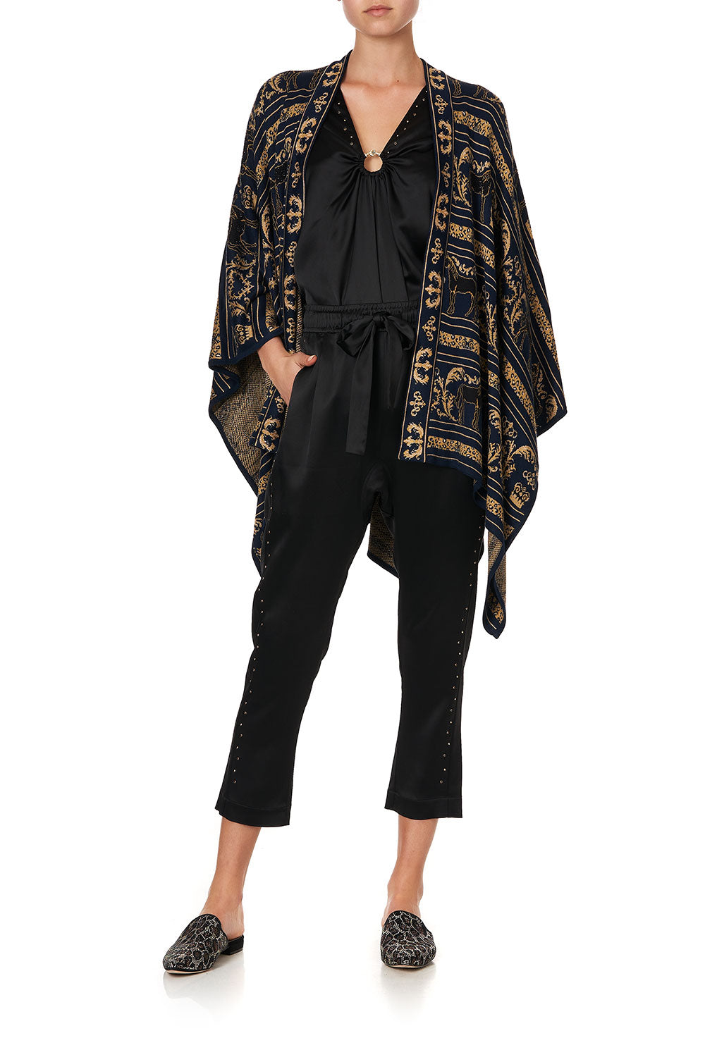 SHORT KNIT PONCHO WITH TIE PUNK OF PRIMROSE