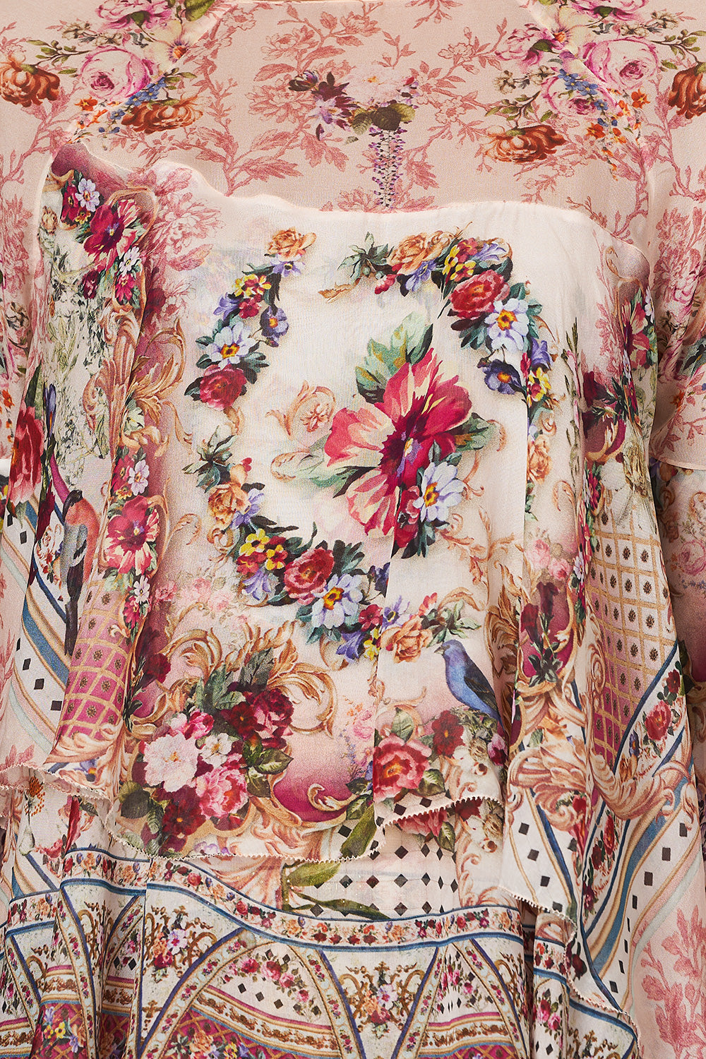 FLARED LAYERED BLOUSE SUMMONED BY A ROSE