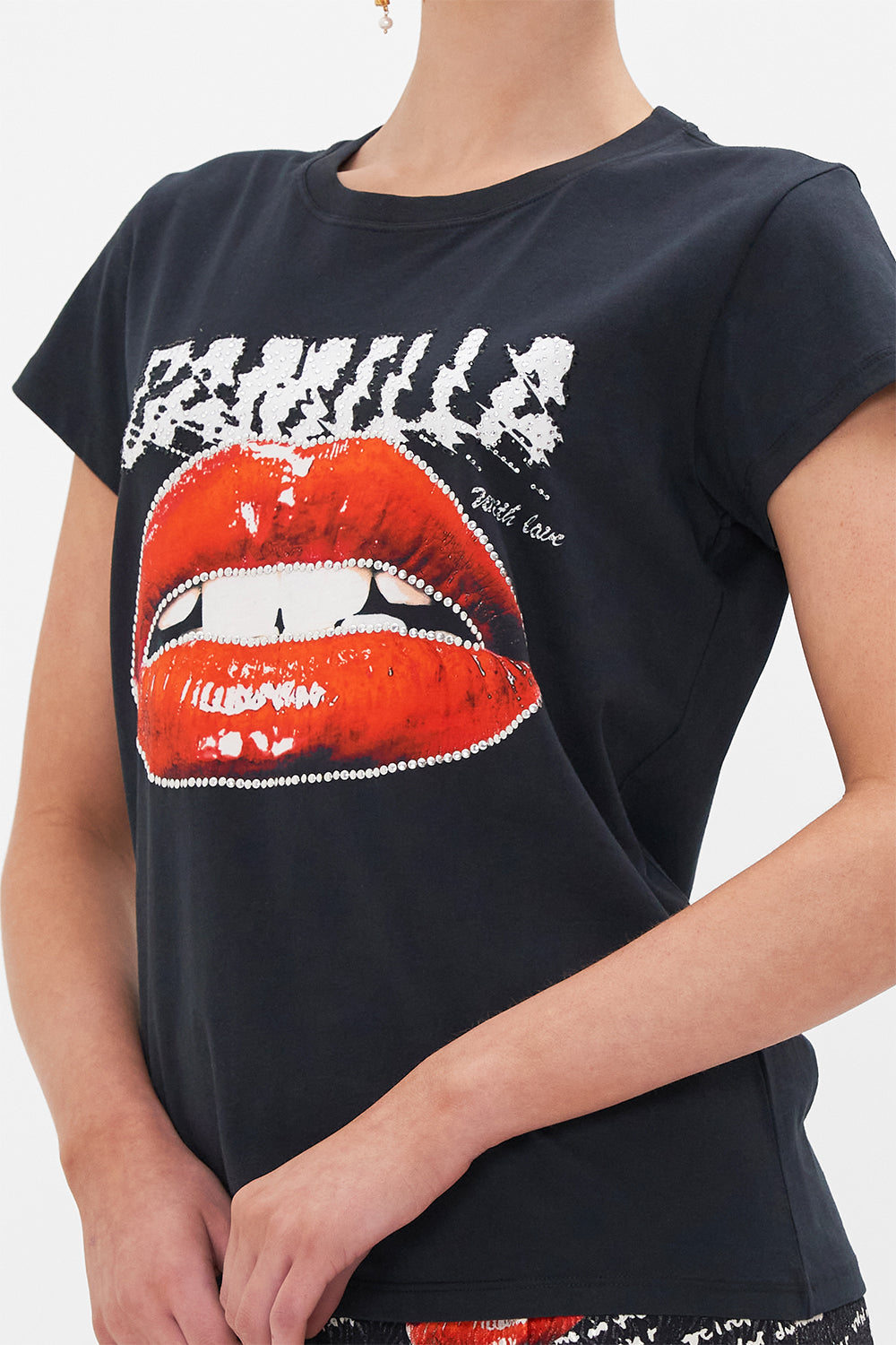 Detail view of model wearing CAMILLA black graphic tee in Chaos Magic print 