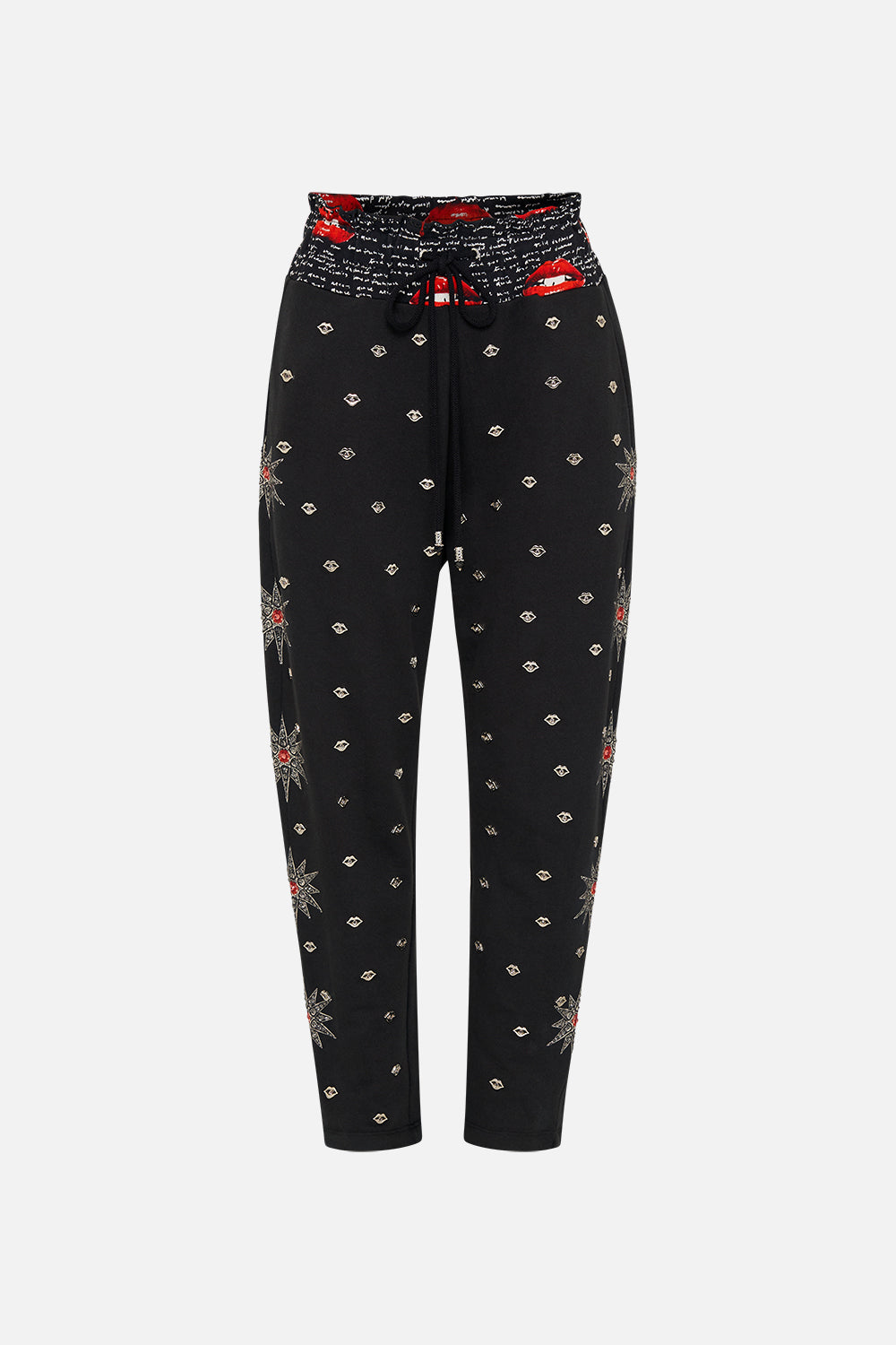 Product view of CAMILLA black trackpants in Chaos Magic print
