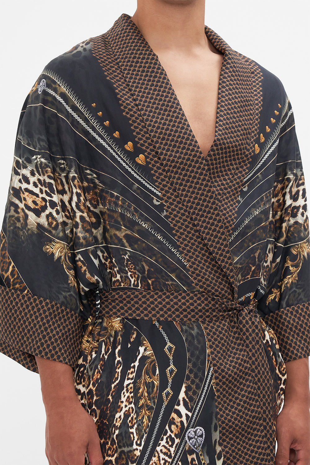 Detail view of model wearing Hotel Franks by CAMILLA mens silk robe in Chaos In The Cosmos  animal print 