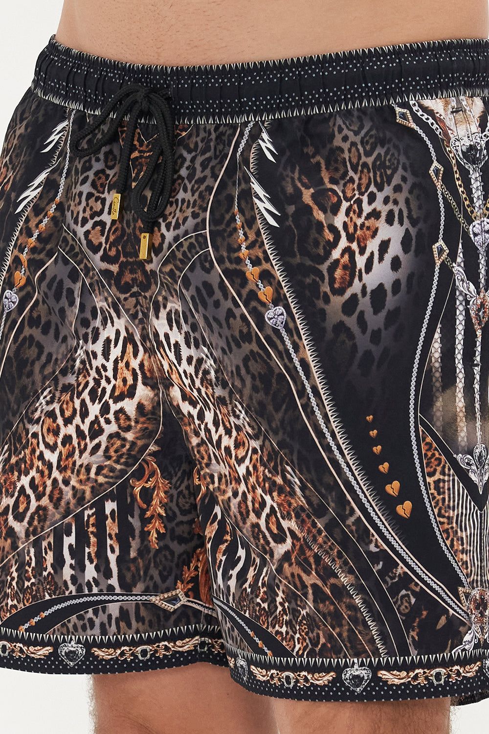 Detail view of model wearing Hotel Franks by CAMILLA mens elastic waist boardshorts in Chaos In The Cosmos animal print 