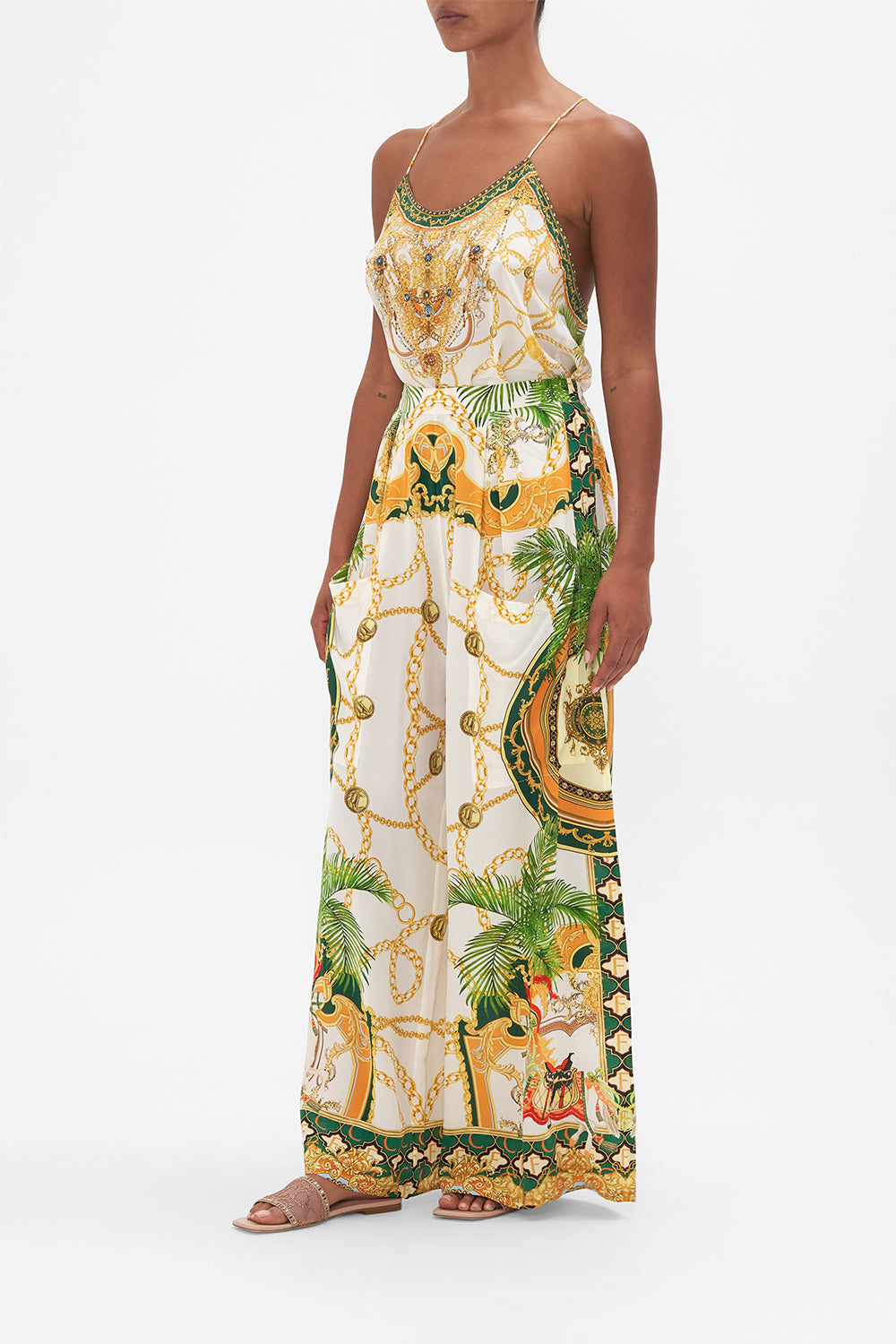 Side view of model wearing CAMILLA silk pants in My Sweet Devotion print 