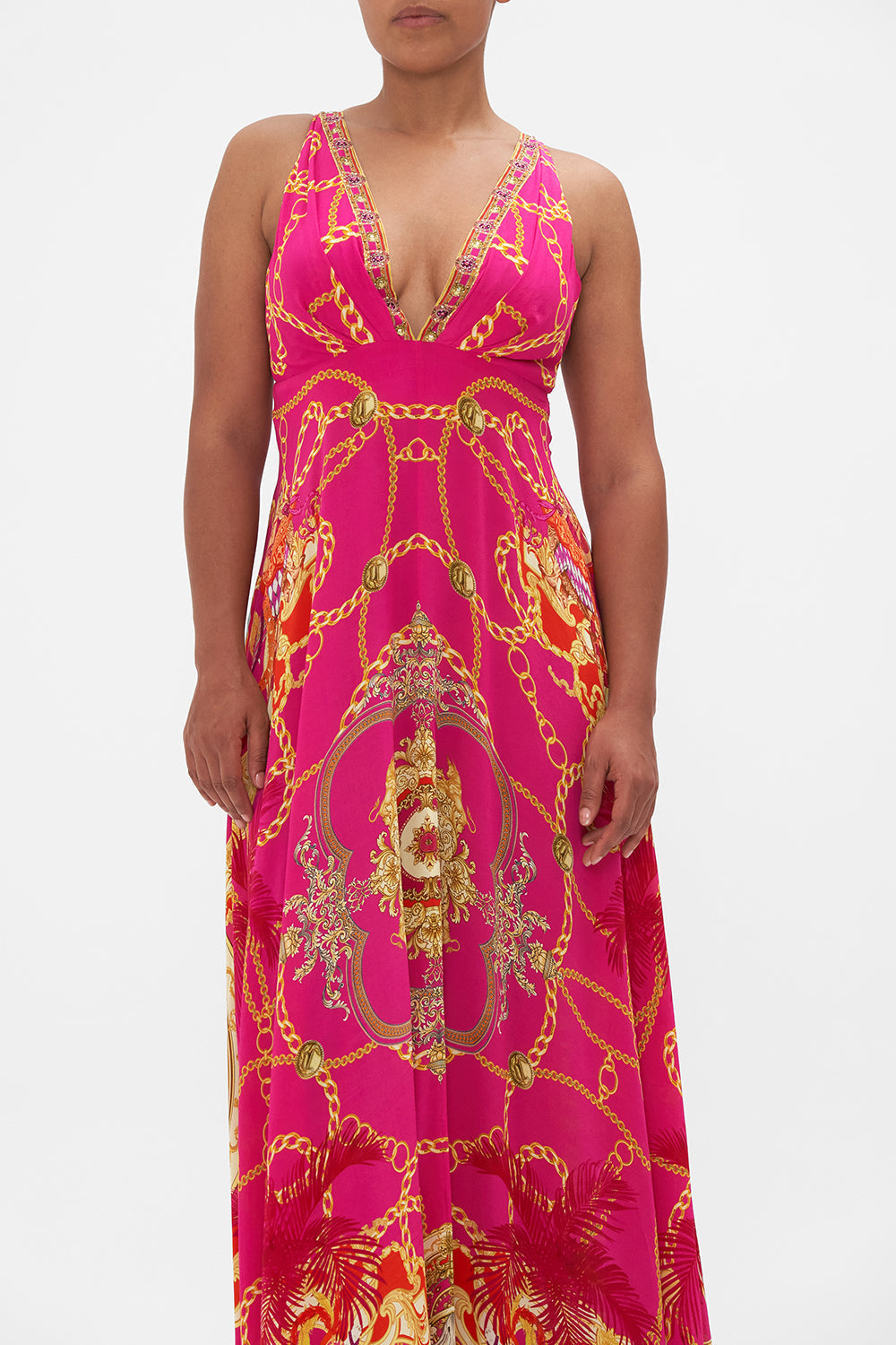 Crop view of model wearing CAMILLA pink silk maxi dress in Wild And Running print