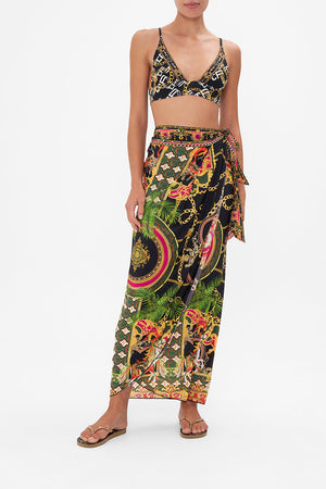 Front view of model wearing CAMILLA long sarong skirt in Jealousy And Jewels print