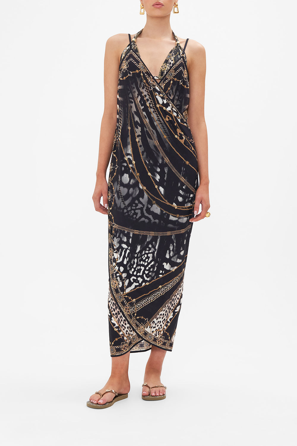 Front view of model wearing CAMILLA animal print sarong dress in Untamed Royalty print