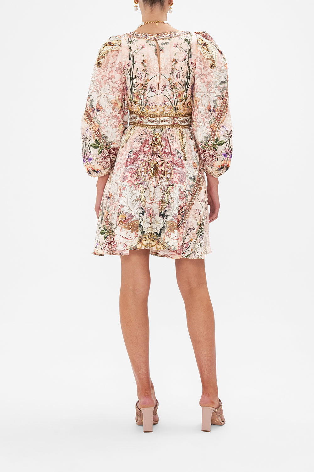 Back view of model wearing CAMILLA floral mini dress in Kissed By The Prince print