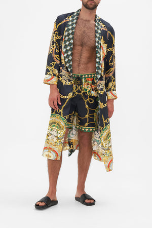 Front view of model wearing Hotel Franks by CAMILLA mens silk robe in Jealousy And Jewels print